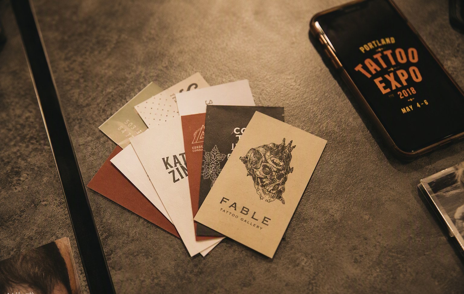 A stack of collected business cards queued for batch scanning